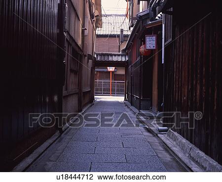 Walking path between houses in Kyoto View Large Photo Image Stock Image - Walking path between houses in Kyoto. Fotosearch