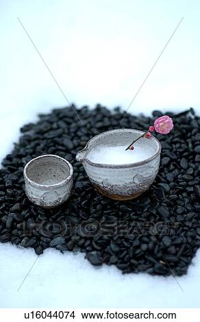 Picture - Japanese plum in a cup. Fotosearch