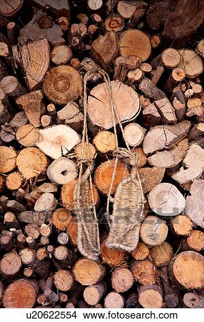 Picture - Straw sandals hanging. Fotosearch