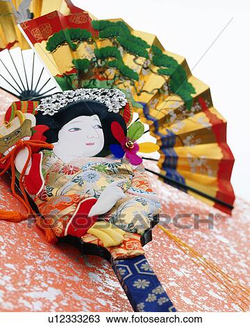 Battledore and folding fan View Large Photo Image Stock Image - Battledore and folding fan. Fotosearch