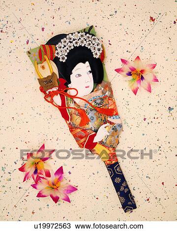 Stock Image - Battledore and paper kite. Fotosearch