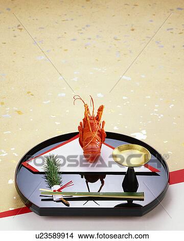 Boiled prawn and sake on a tray View Large Photo Image Picture - Boiled prawn and sake on a tray. Fotosearch