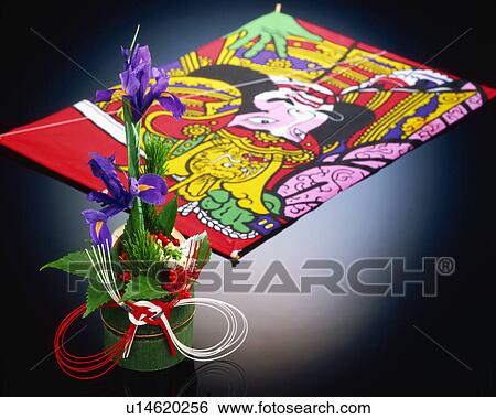Stock Photograph - Flower arrangement and kite. Fotosearch