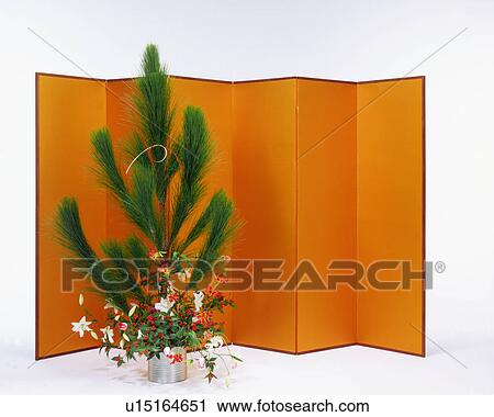 Flower arrangement in front of golden screen View Large Photo Image Stock Image - Flower arrangement in front of golden screen. Fotosearch