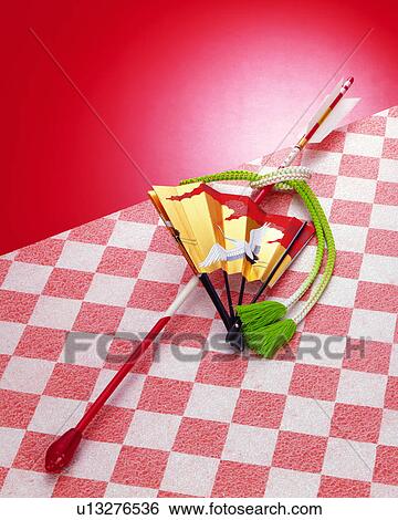 Folding fan and arrow View Large Photo Image Stock Photograph - Folding fan and arrow. Fotosearch