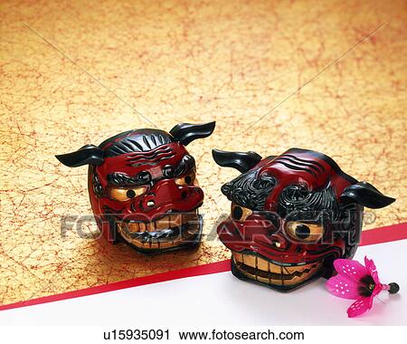 Stock Image - Lion mask and shuttlecock. Fotosearch