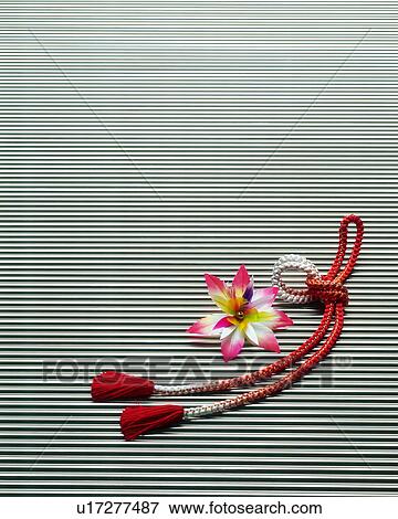 Stock Photo - Obi band and shuttlecock. Fotosearch