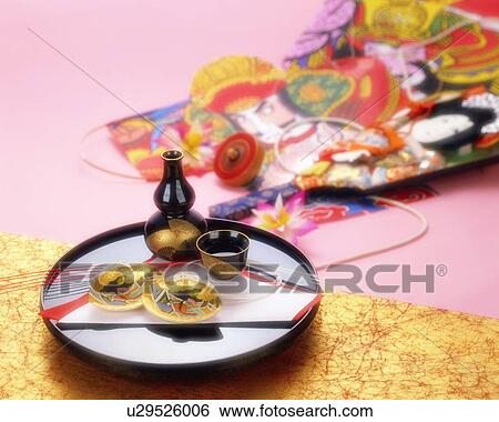 Sake cup and battledore View Large Photo Image Stock Photograph - Sake cup and battledore. Fotosearch