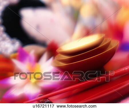 Stock Photo - Sake cups and battledore. Fotosearch