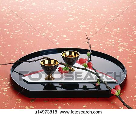Stock Photo - Sake cups on a tray. Fotosearch