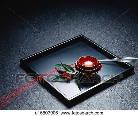 Stock Photograph - Sake cups on a tray. Fotosearch