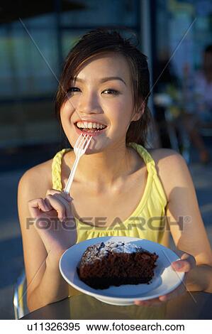 Young Lady Eating Cake View Large Photo Image Stock Photography - Young Lady Eating Cake. Fotosearch