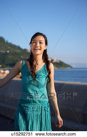 Young Lady Walking along Promenade View Large Photo Image Stock Image - Young Lady Walking along Promenade. Fotosearch