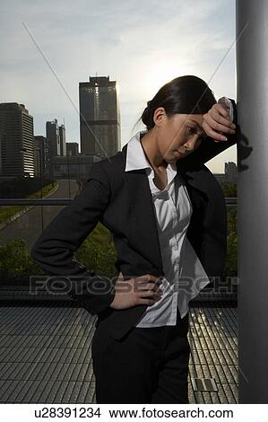 Young Businesswoman Standing in Street View Large Photo Image Picture - Young Businesswoman Standing in Street. Fotosearch