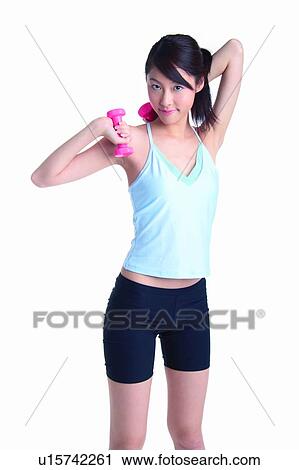 Young woman holding red apple, front view View Large Photo Image Stock Image - Young woman holding red apple, front view. Fotosearch