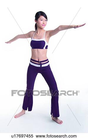 Young woman with arms outstretched, smiling View Large Photo Image Stock Photography - Young woman with arms outstretched, smiling. Fotosearch