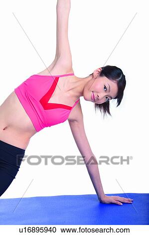 Young woman with hand supporting whole body View Large Photo Image Stock Image - Young woman with hand supporting whole body. Fotosearch