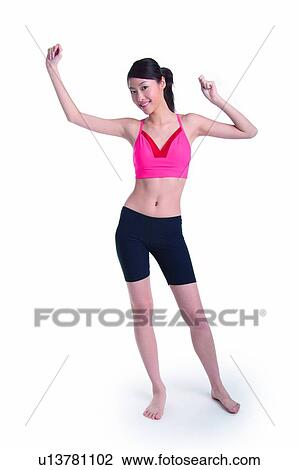 Young woman doing exercise View Large Photo Image Stock Image - Young woman doing exercise. Fotosearch