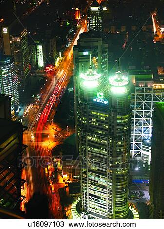 Stock Image - China, Shanghai, Pudong Financial District at night, aerial view. Fotosearch