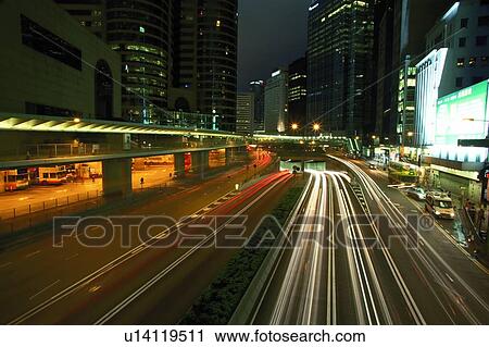 Stock Image - Connaught Road Central at Night. Fotosearch