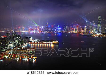 Stock Image - Symphony of Light, Hong Kong Victoria Harbour and city skyline. Fotosearch