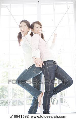 Stock Image - Girl friend with good relations. Fotosearch