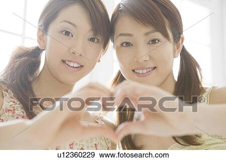 Stock Photo - Girl friend with good relations. Fotosearch