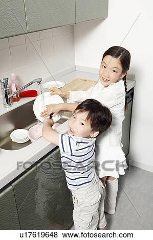 Stock Photo - Kitchen help. Fotosearch