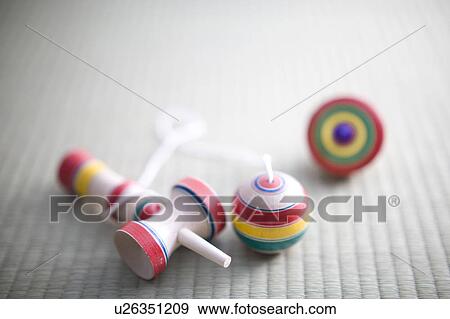 Stock Photo - Cup and ball and Top. Fotosearch