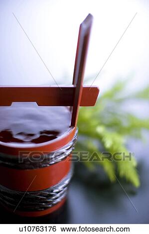 Stock Photograph - Sacred sake. Fotosearch