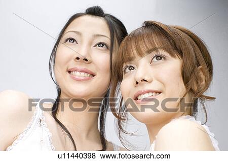 Stock Photo - Portrait of women. Fotosearch