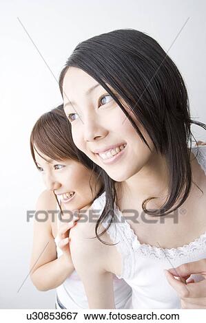 Stock Photo - Portrait of women. Fotosearch