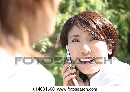 Stock Image - Woman who has a portable. Fotosearch