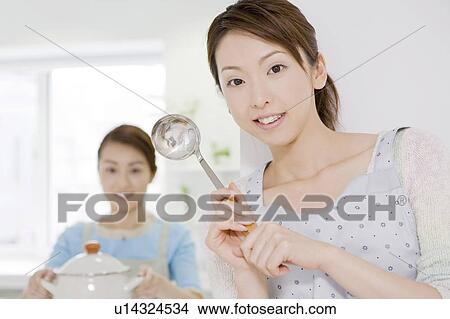 Women who cook View Large Photo Image Picture - Women who cook. Fotosearch