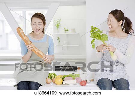 Women who cook View Large Photo Image Stock Photo - Women who cook. Fotosearch