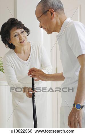 Stock Photograph - Elderly couple who does going out. Fotosearch
