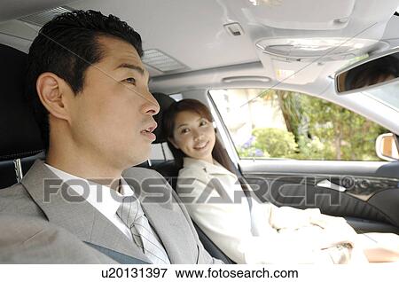 Husband and wife go to office View Large Photo Image Stock Photo - Husband and wife go to office. Fotosearch