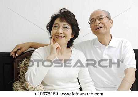 Relaxing elderly couple View Large Photo Image Stock Photo - Relaxing elderly couple. Fotosearch