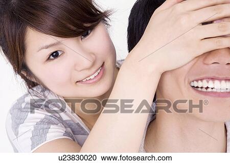 Blindfolding sweetheart View Large Photo Image Stock Image - Blindfolding sweetheart. Fotosearch