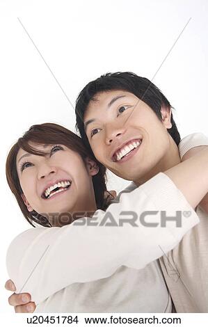 Picture - Couple enbracing each other. Fotosearch