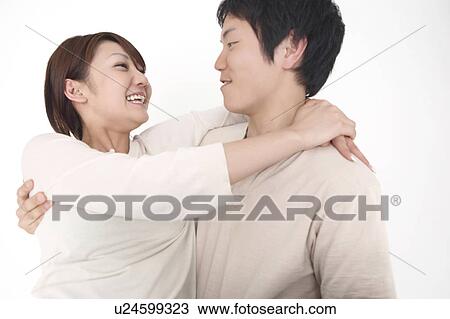 Couple enbracing each other View Large Photo Image Stock Image - Couple enbracing each other. Fotosearch