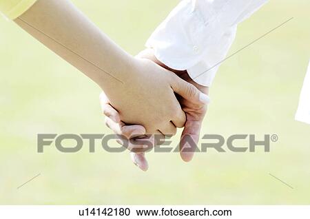 Couple who joins a hand View Large Photo Image Stock Image - Couple who joins a hand. Fotosearch
