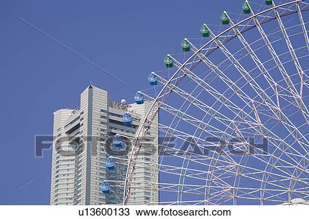 Ferris wheel and Landmark Tower View Large Photo Image Stock Image - Ferris wheel and Landmark Tower. Fotosearch