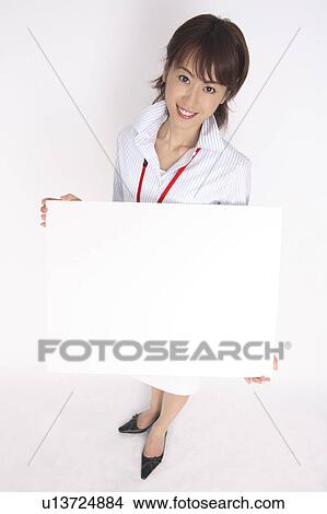 Business lady with the message board View Large Photo Image Picture - Business lady with the message board. Fotosearch