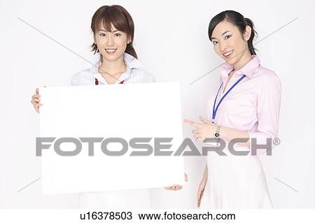 Stock Image - Business lady with the message board. Fotosearch