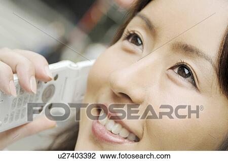 Office lady who speaks with the cell phone View Large Photo Image Stock Image - Office lady who speaks with the cell phone. Fotosearch