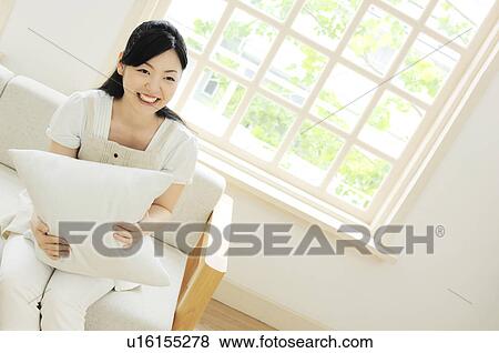Stock Photo - Smileing woman. Fotosearch