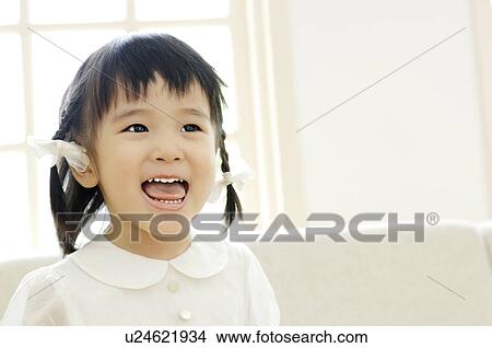 Picture - Smiling girl. Fotosearch