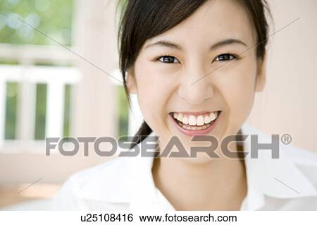 Stock Photograph - Smiling woman. Fotosearch