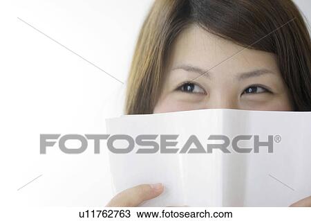Woman reading a book View Large Photo Image Stock Image - Woman reading a book. Fotosearch
